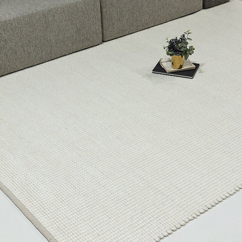 Tapis en pure laine tissée à la main