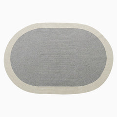 Wollgrauer geflochtener Teppich aus der Kollektion